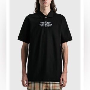 Burberry location print black polo shirt. Size XS